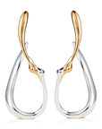 A pair of modern teardrop-shaped hoop earrings in polished silver and yellow gold, shown against a clean white background.