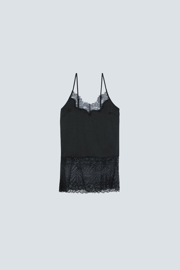 A black camisole top with thin straps, a lace-trimmed scoop neckline, and a lace hem, displayed against a solid light gray background.