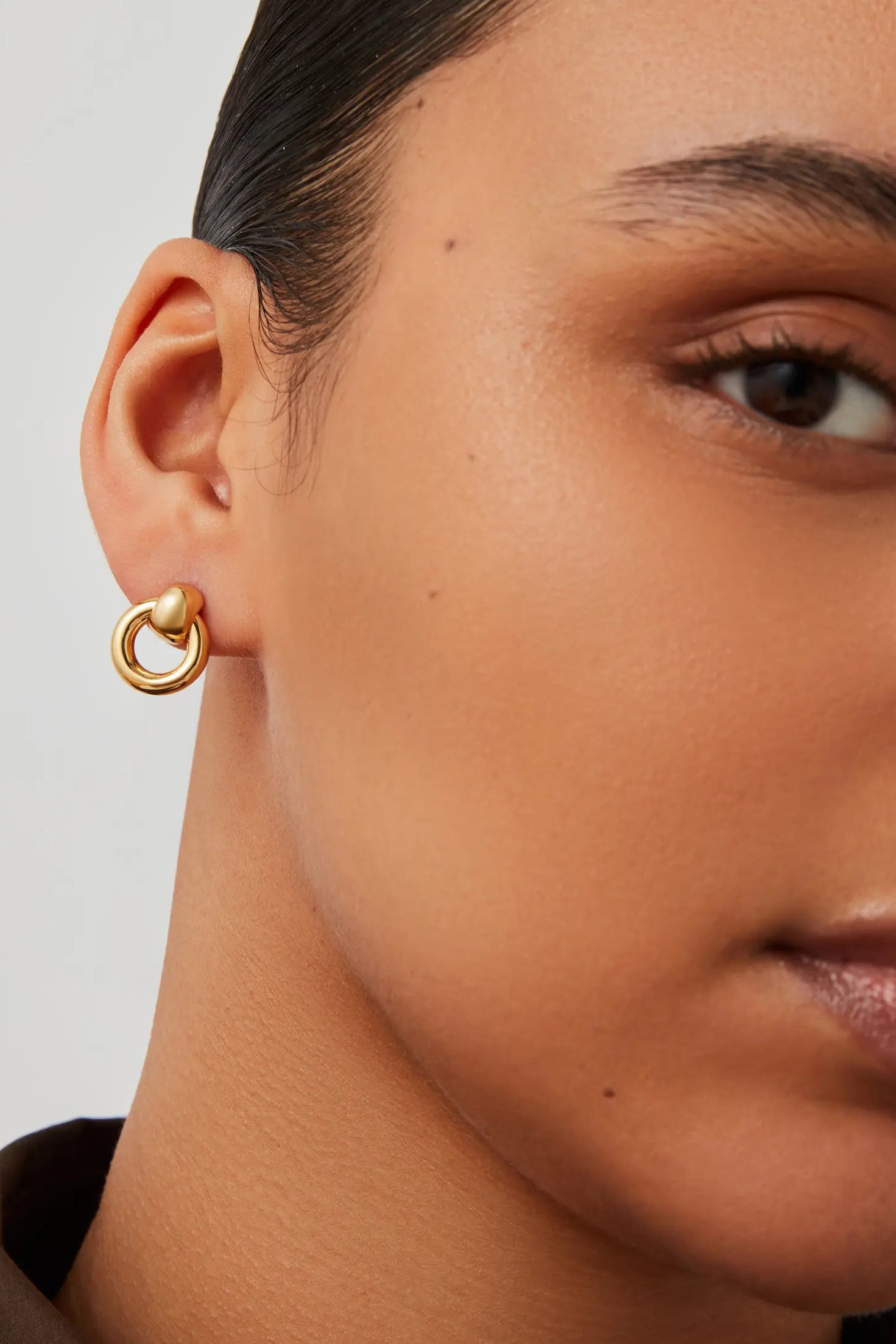 Mini Puffy Faye Knocker Earrings on model