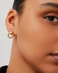 Mini Puffy Faye Knocker Earrings on model