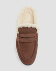 A single brown suede slip-on loafer with a thick cream-colored shearling lining, shown from a top-down view on a light gray background.