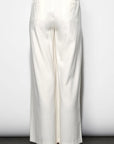 White wide-leg pants on a plain background