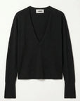 black v neck sweater flat on a grey background 