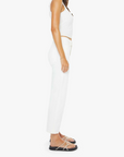 Woman wearing a white outfit on a white background