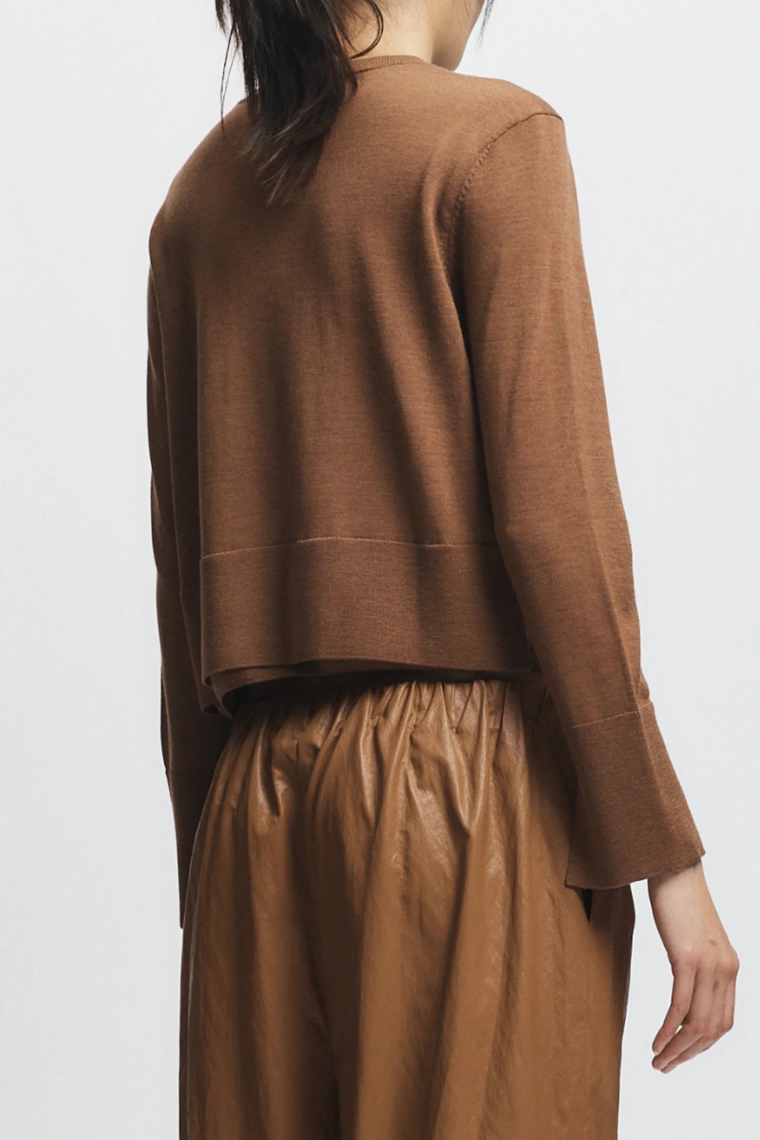 Person wearing Elodie Sweater Clove on a white background, back