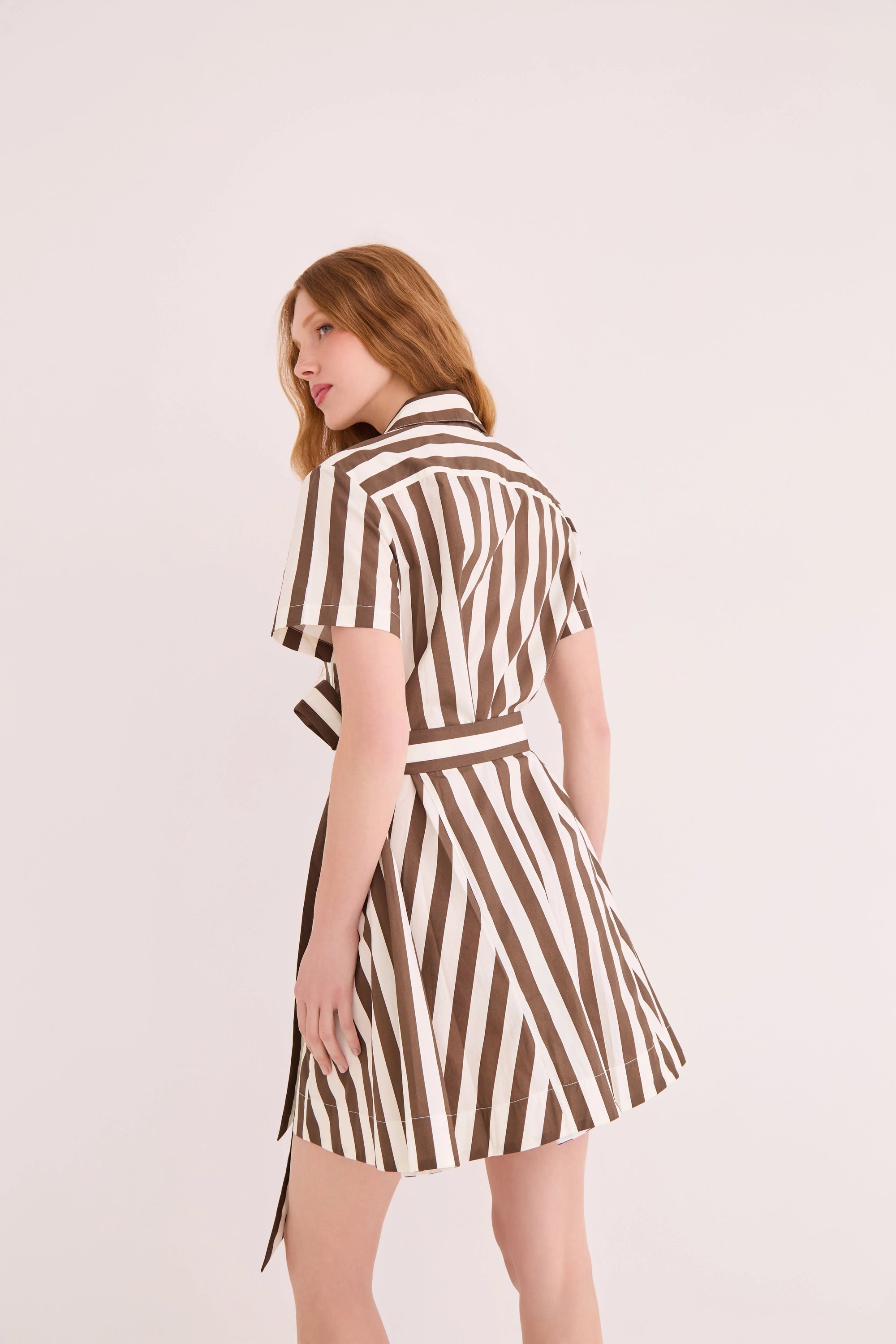 Lagos Dress back and partial side view on model