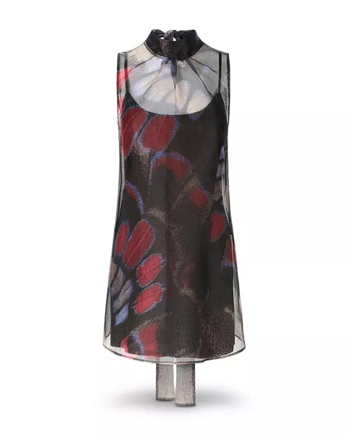A sleeveless high-neck dress displayed on a mannequin against a white background. The dress features a sheer black mesh overlay with a colorful abstract butterfly-wing style print in red, blue, and gray over a black base.
