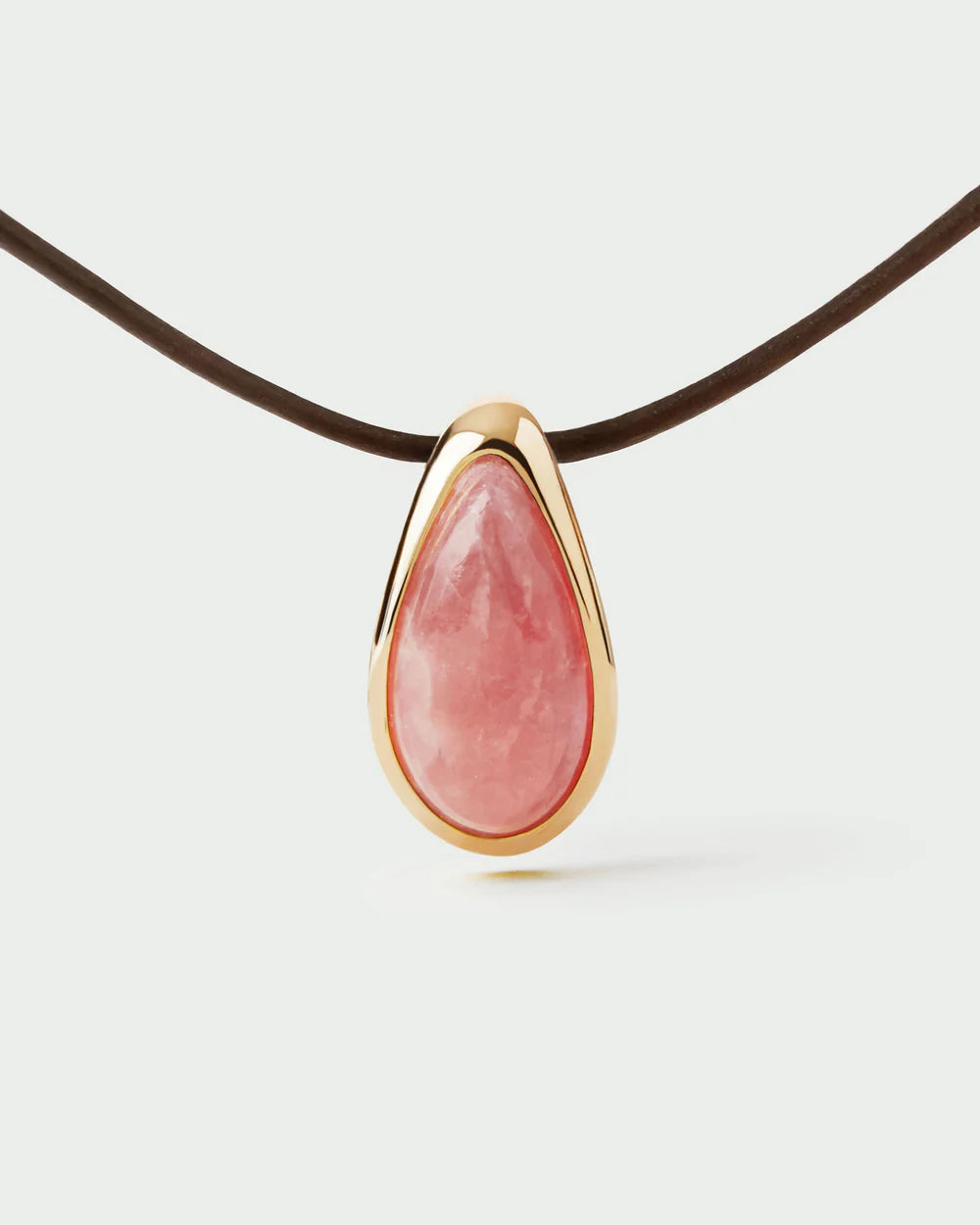 Rhodochrosite Luna Cord Necklace close up pf pendant