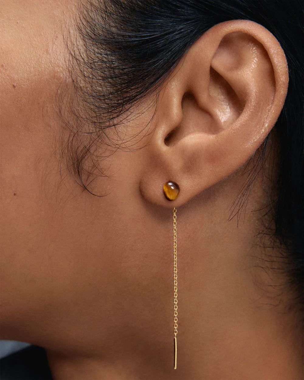 Tiger Eye Lyra Earrings on ear