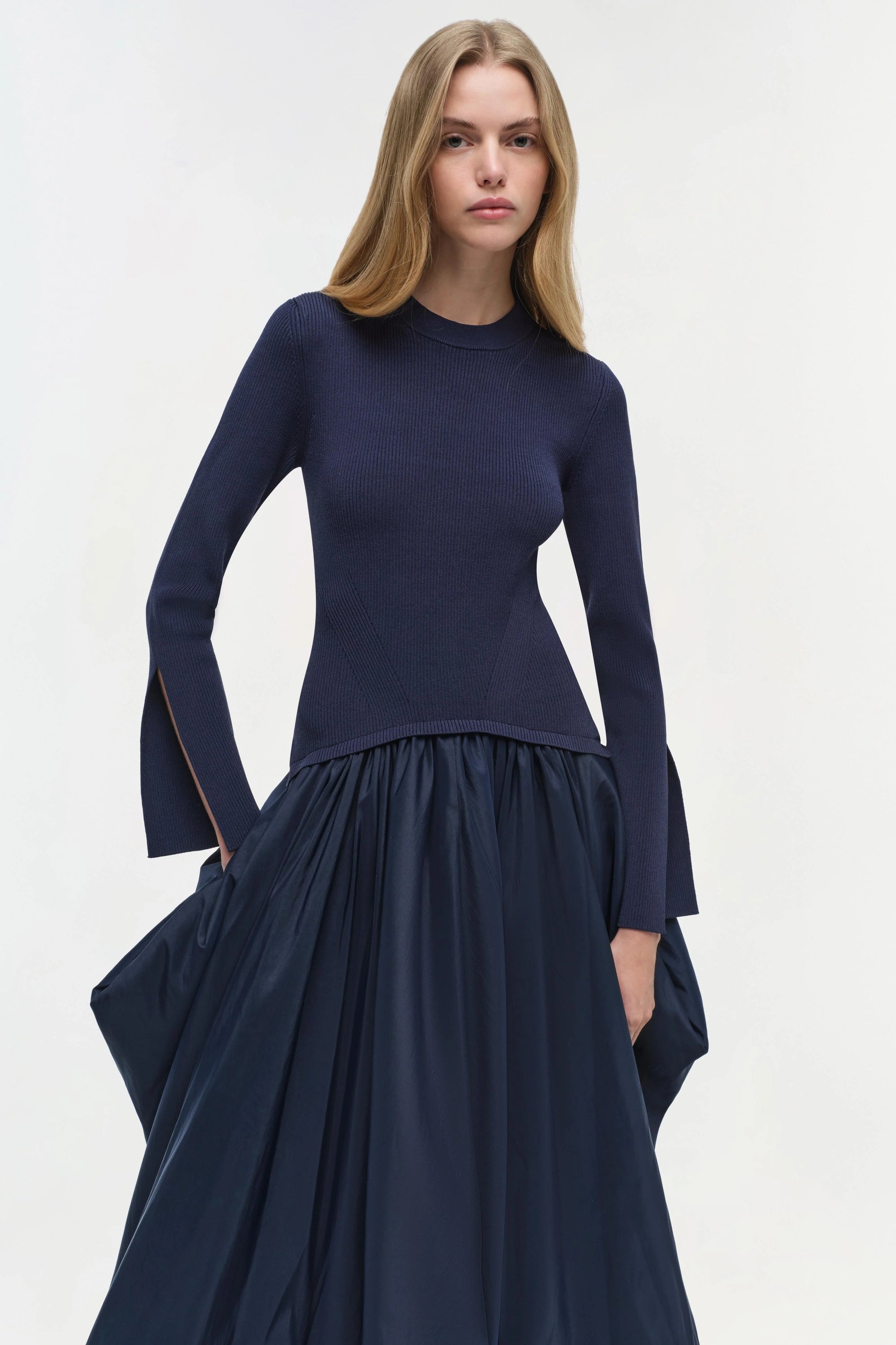 Kenlie Taffeta Knit Midi Dress on a model with a white background