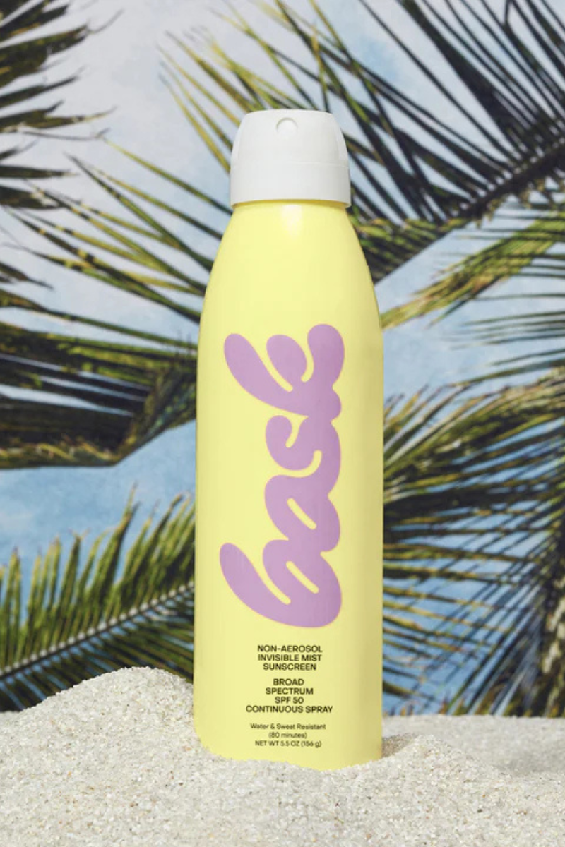 Bask SPF 50 Non-Aerosol Spray Sunscreen on the beach