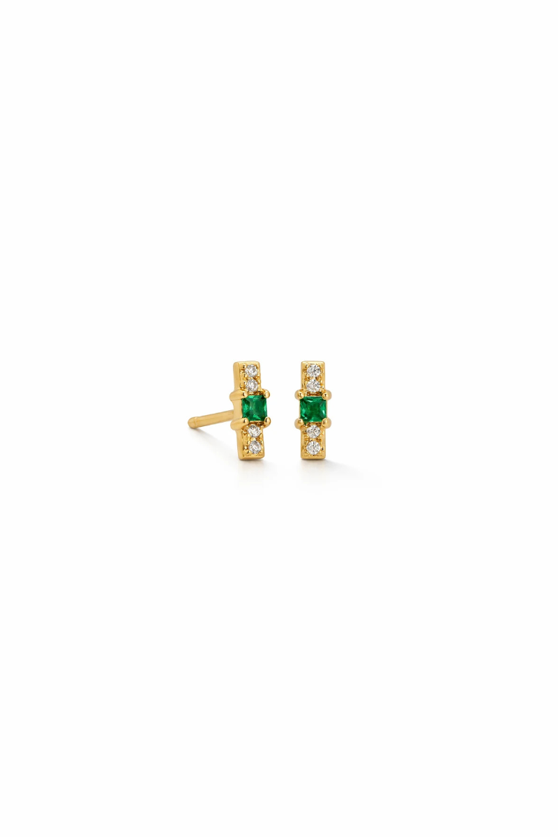 A pair of gold post earrings featuring a central green rectangular gemstone, flanked by small clear stones, shown on a plain white background.