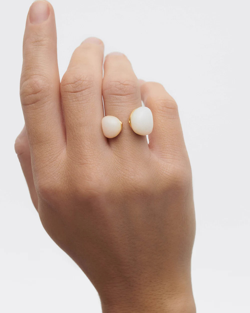 Quartz Gravity Ring on ring finger