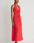 Woman wearing a red dress on a white background