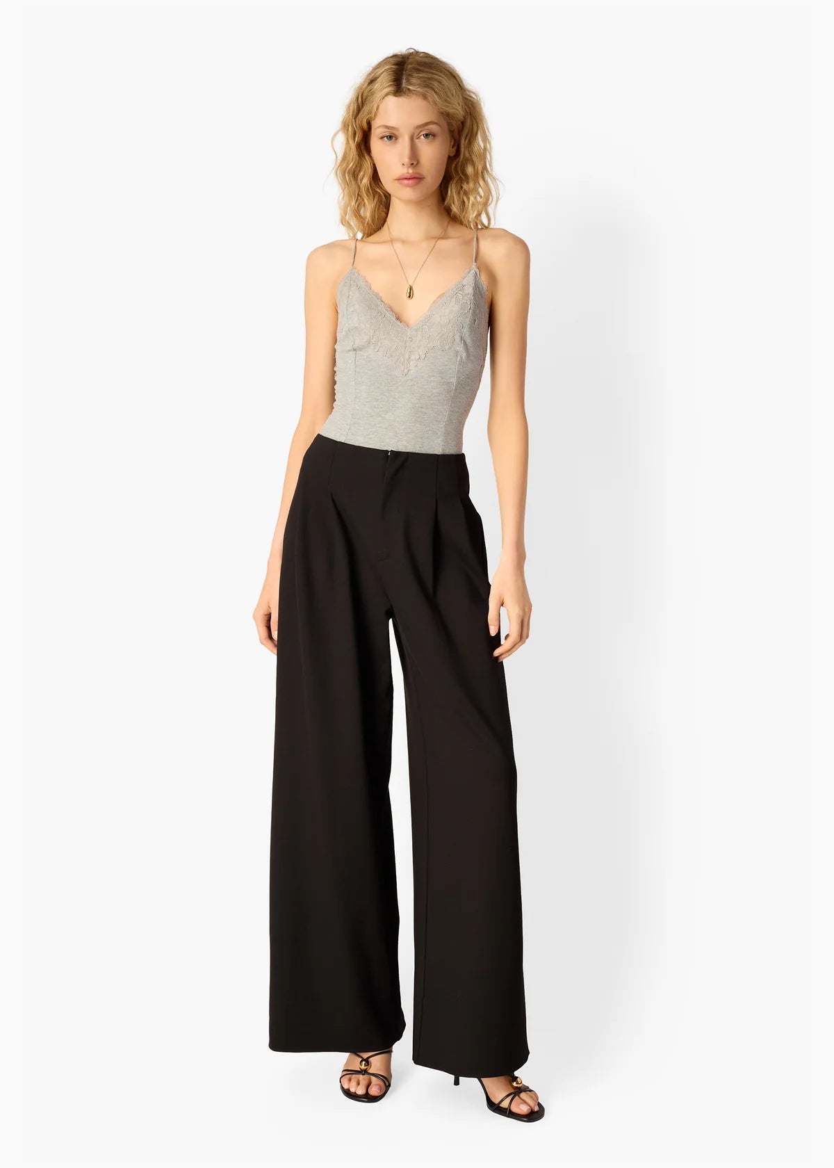 Amani Rib Knit Bodysuit with black pant, full body front