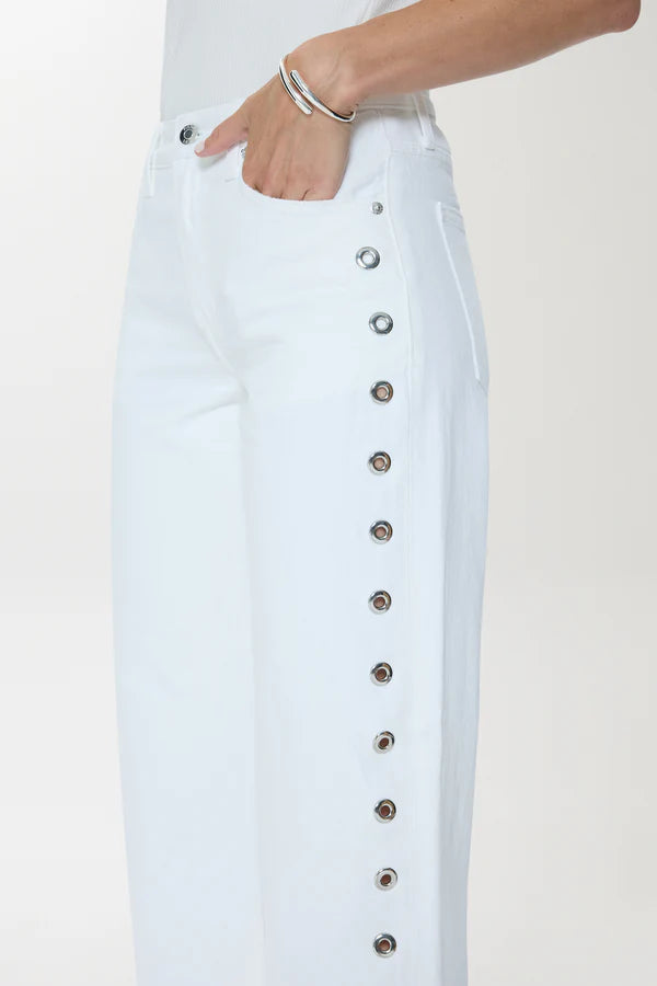 Light blue denim skirt with button details on a white background