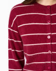 close up of a stripe cardigan on a model with tonal buttons 