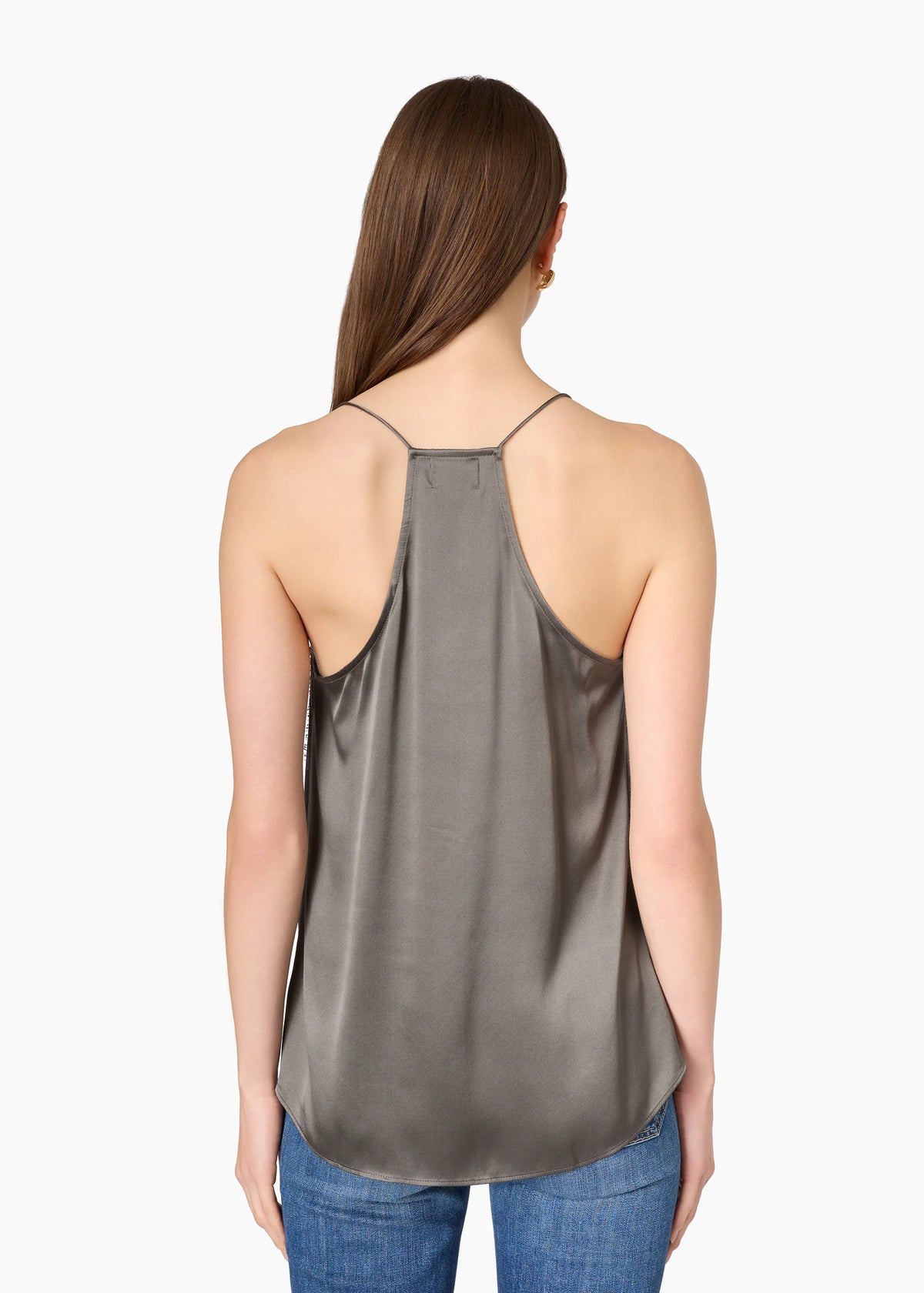 model wearing a gunmetal colored racerback cami with a lace trim and blue jeans on a white background, back view 