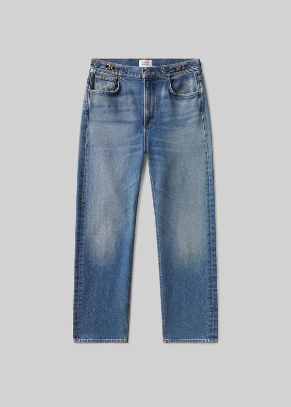 Blue jeans on a gray background product view