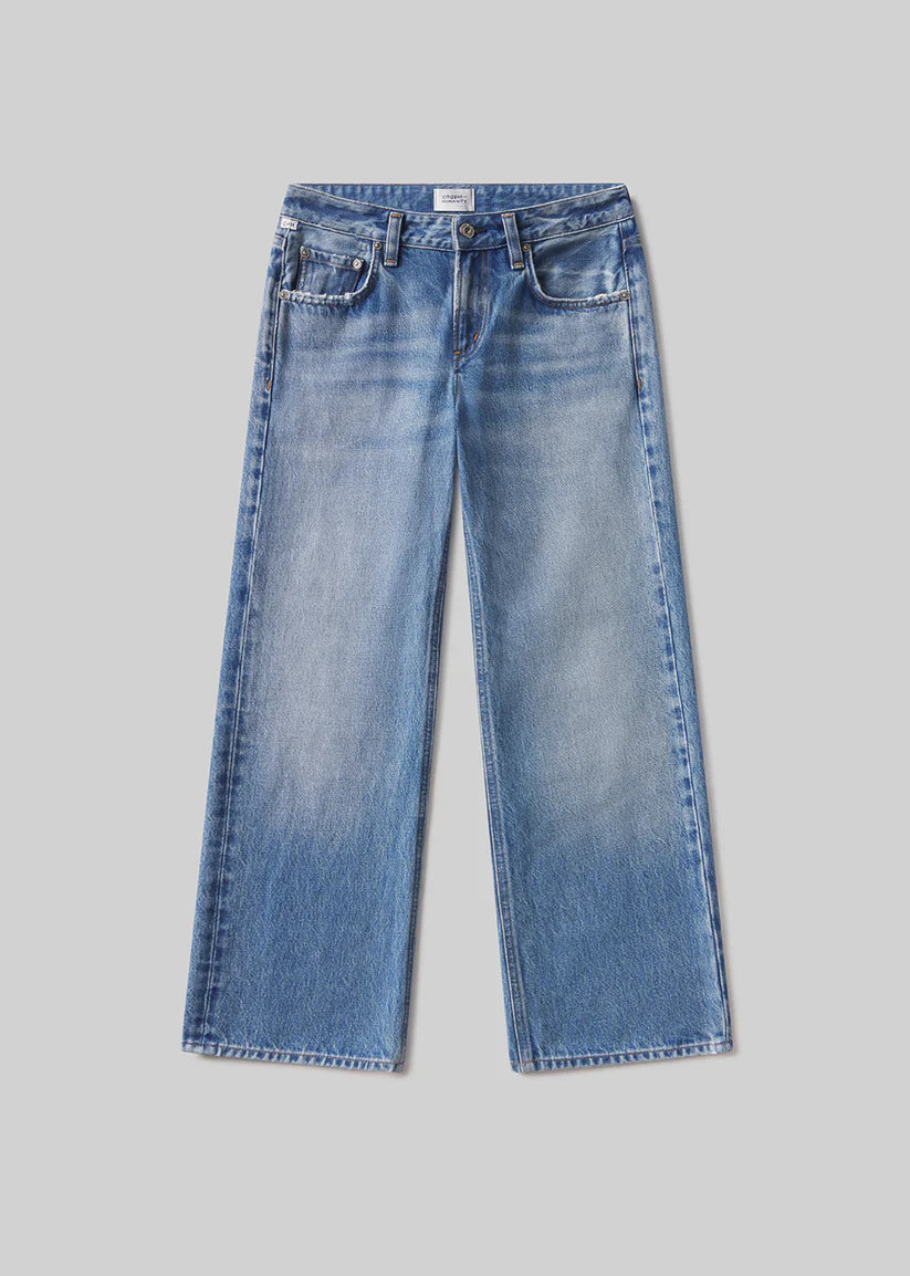Blue jeans on a gray background