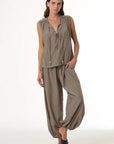 Arna Harem Jogger full body front view on model with her leg propped up against her ankle