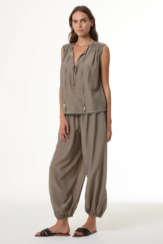 Arna Harem Jogger full body front view on model with her hand on her leg