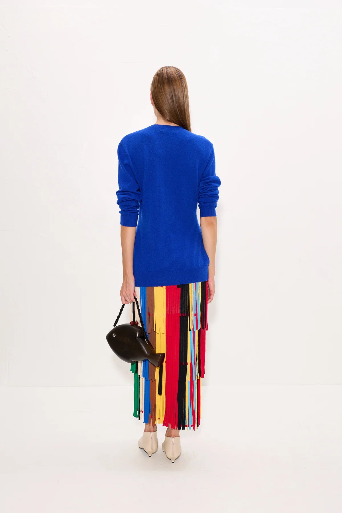 Ada Cardigan back view on model with sleeves rolled up