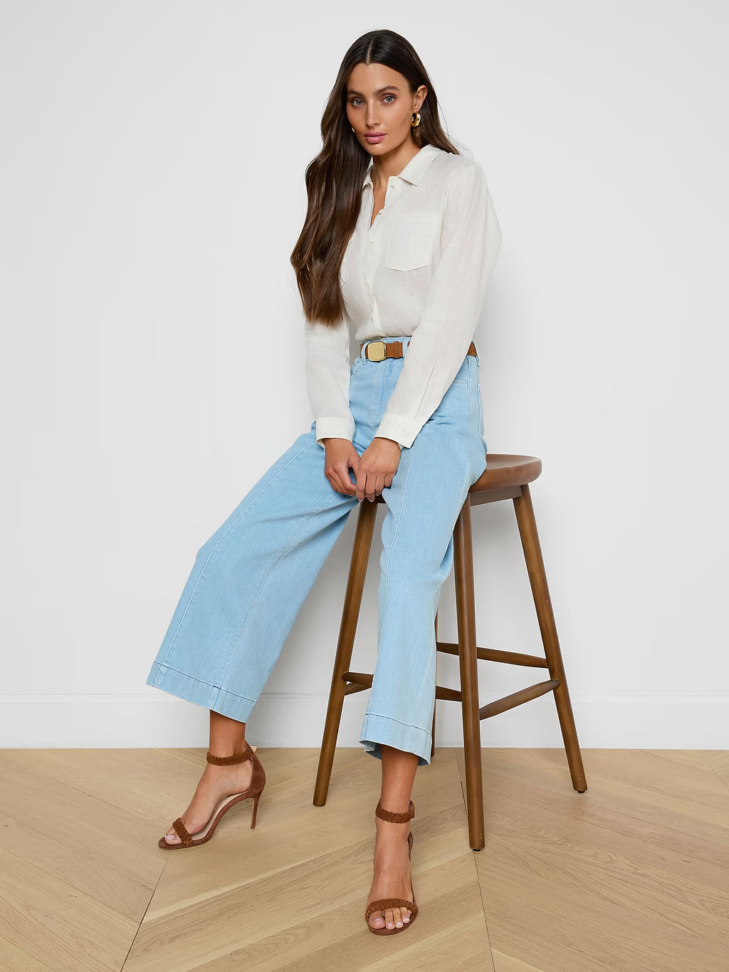 Houston Cropped Wide-Leg Jean model sitting on stool