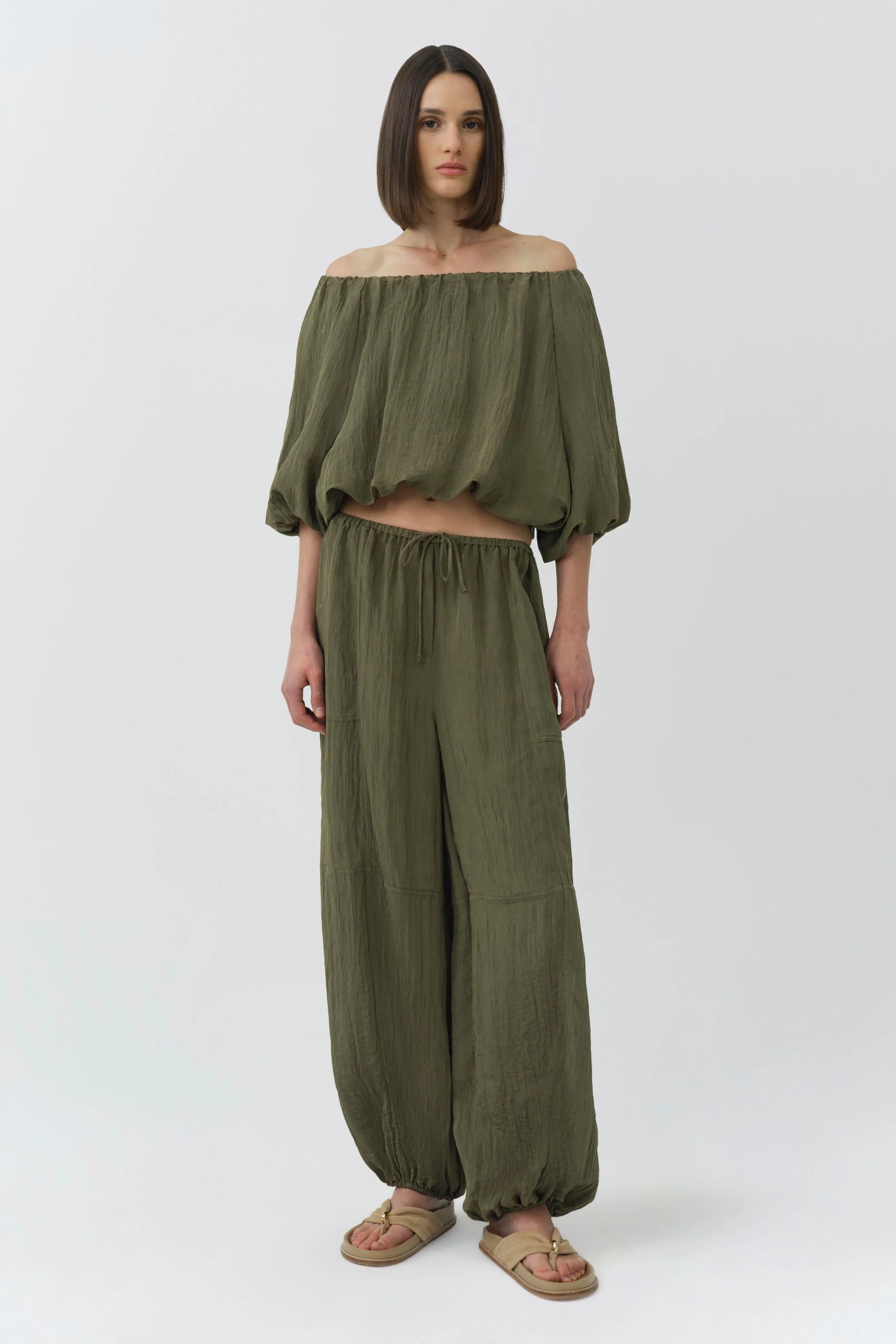 Anni Puff Sleeve Cropped Top, worn off shoulder, and Freya Parachute Pant full body front