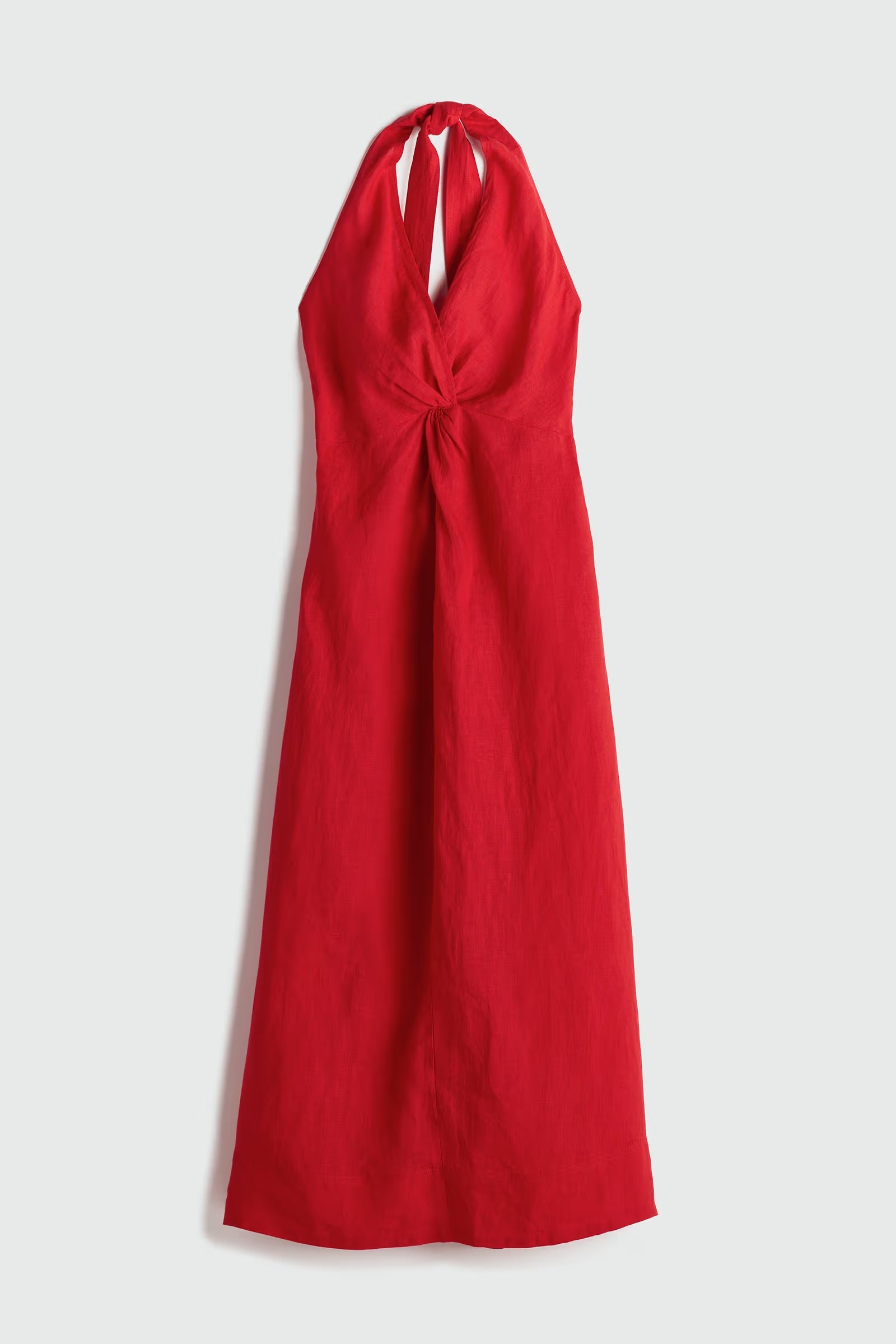 Red halter neck dress on a white background
