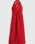 Red halter neck dress on a white background