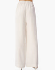 White wide-leg pants on a white background