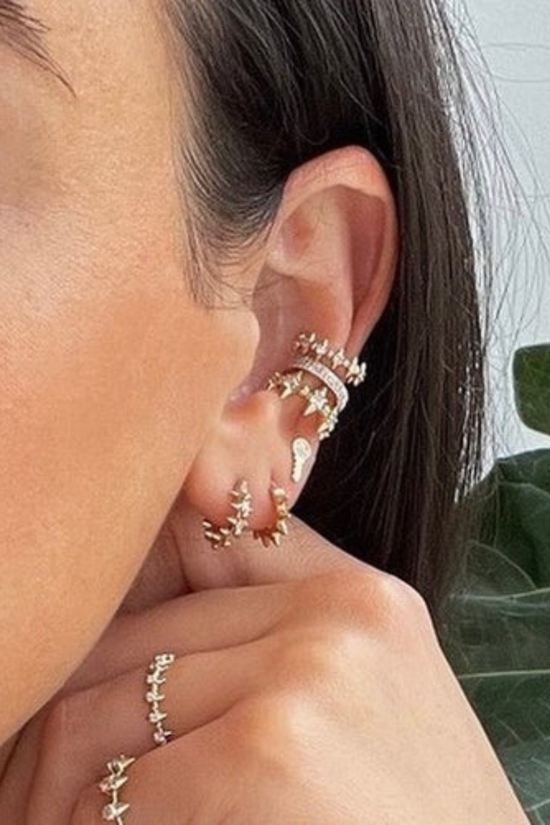 Adina Reyter London Pave Spike Huggie on ear
