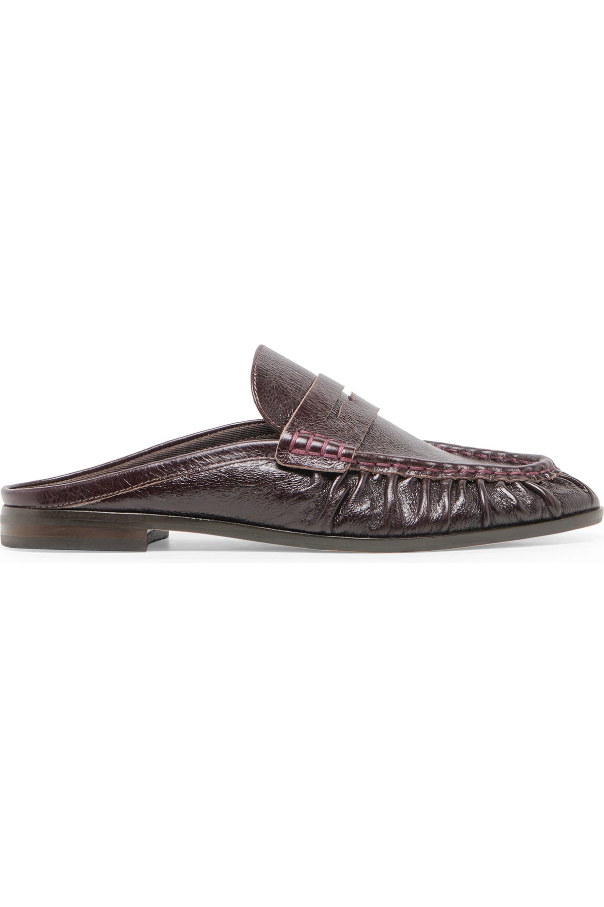 A single dark brown leather mule loafer with a textured finish, gathered detailing around the toe, and contrast stitching, shown from a side profile on a white background.
