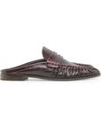 A single dark brown leather mule loafer with a textured finish, gathered detailing around the toe, and contrast stitching, shown from a side profile on a white background.