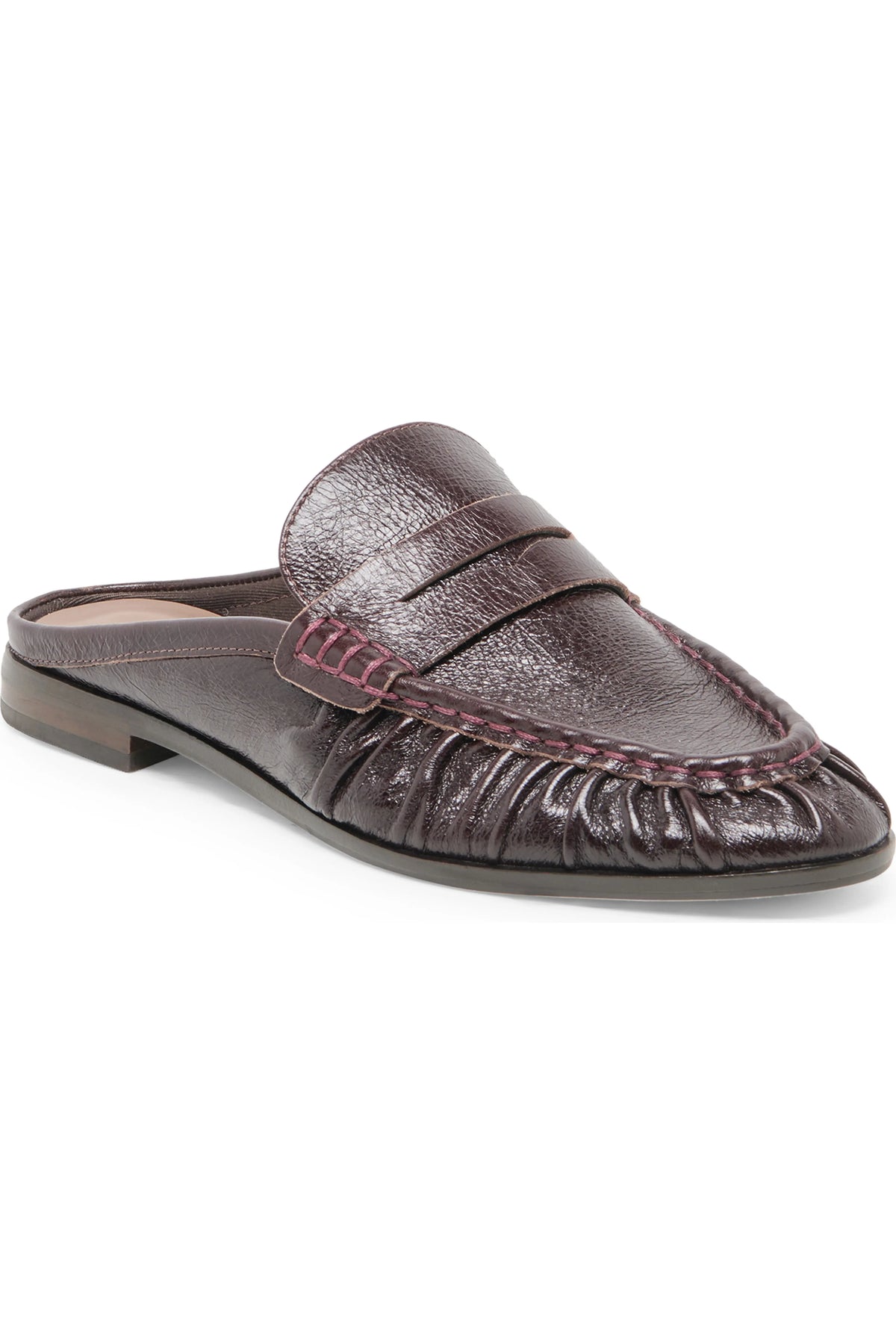 A dark brown textured leather mule loafer with a pebbled finish, featuring a stitched strap across the vamp and gathered detailing around the toe, shown against a plain white background.