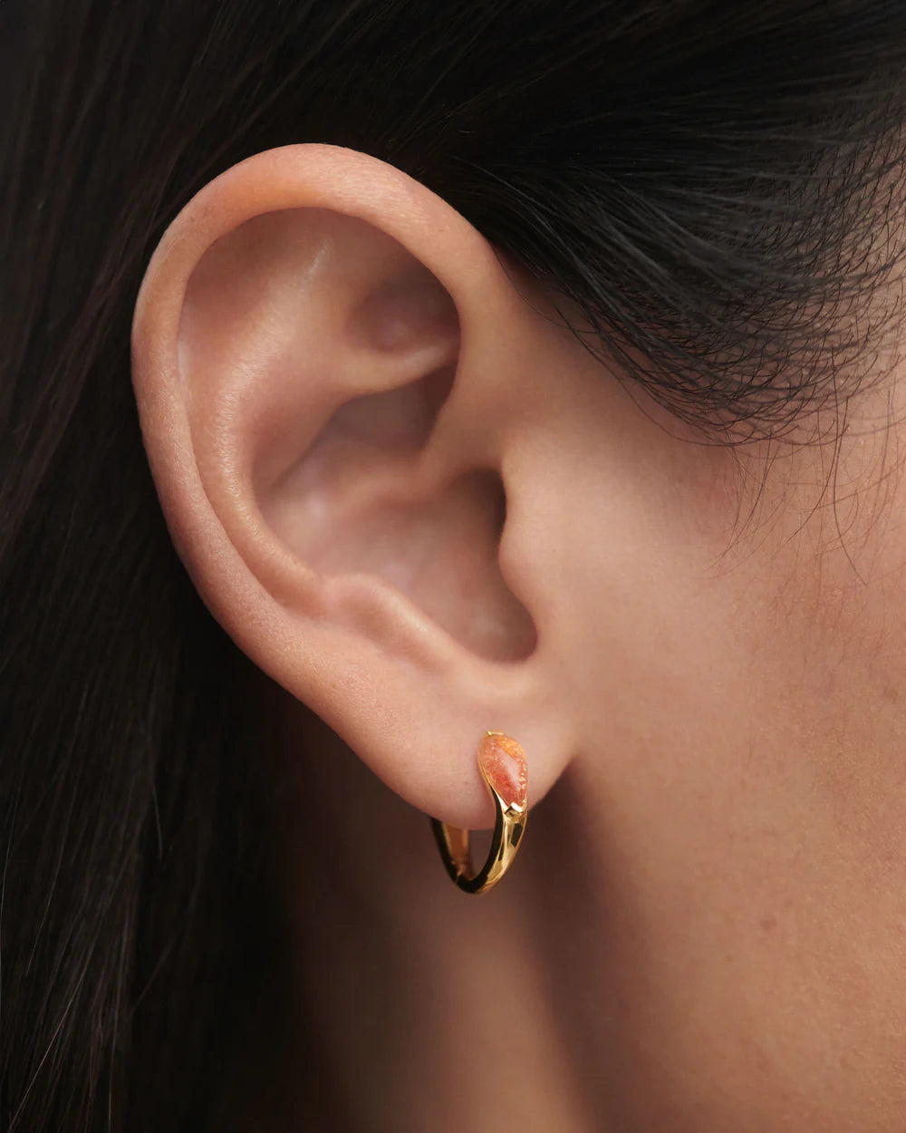 Sunstone Isla Hoops close up on ear