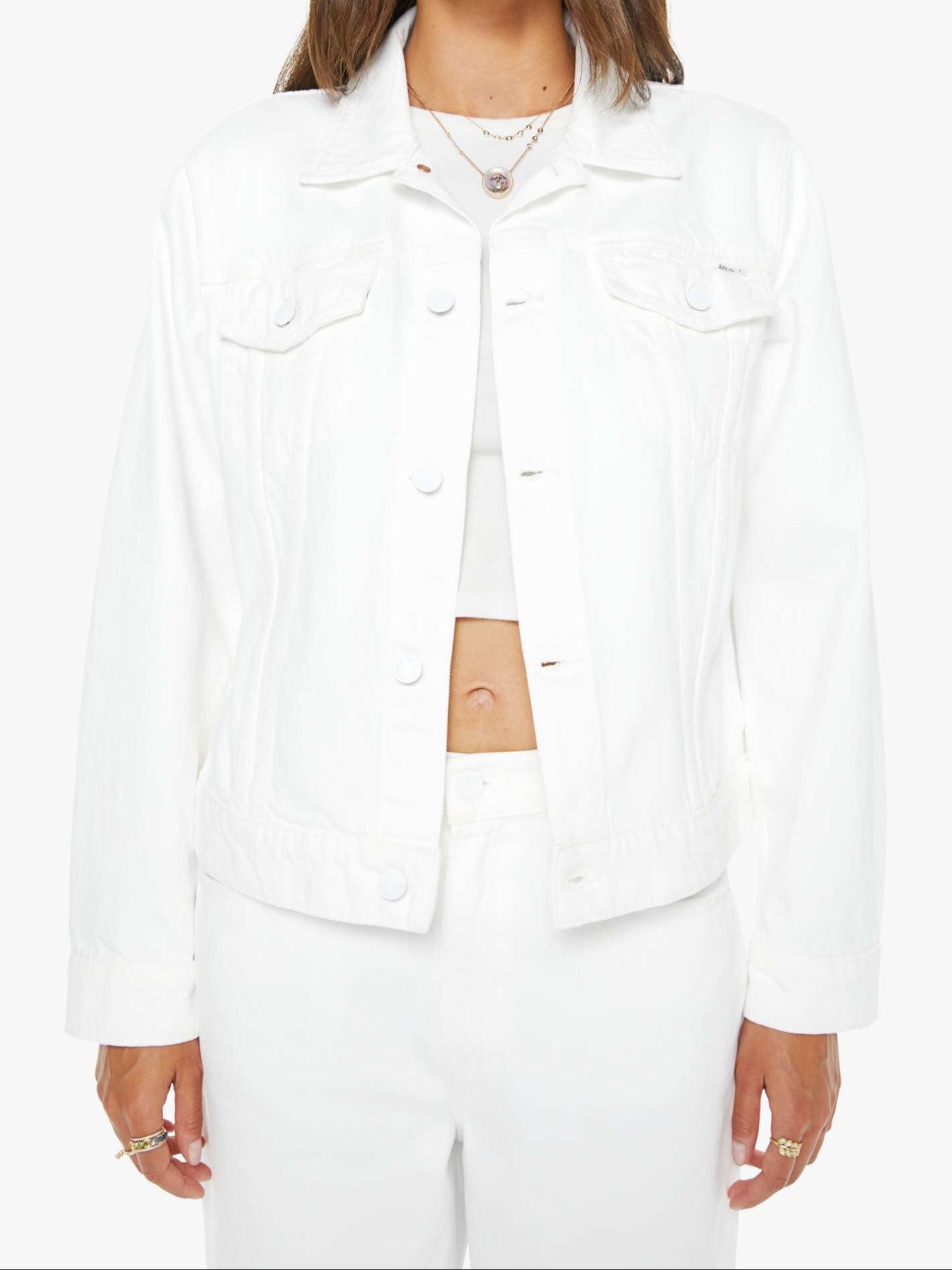 Woman wearing a white outfit on a white background