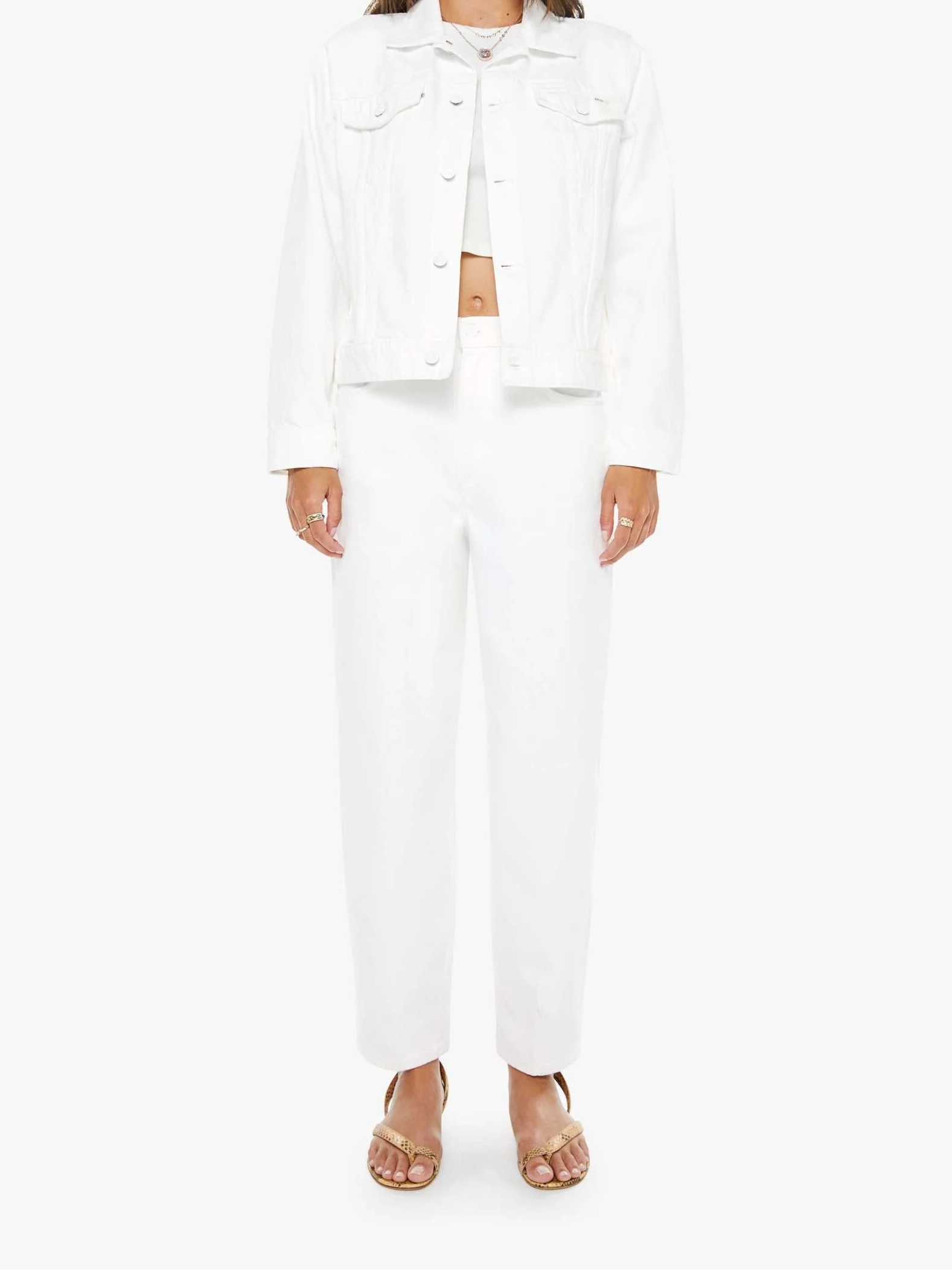Woman wearing a white outfit on a white background