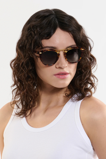 Krewe Beau II Kyoto Tortoise 18k Polarized Sunglasses on heart face shape, female model