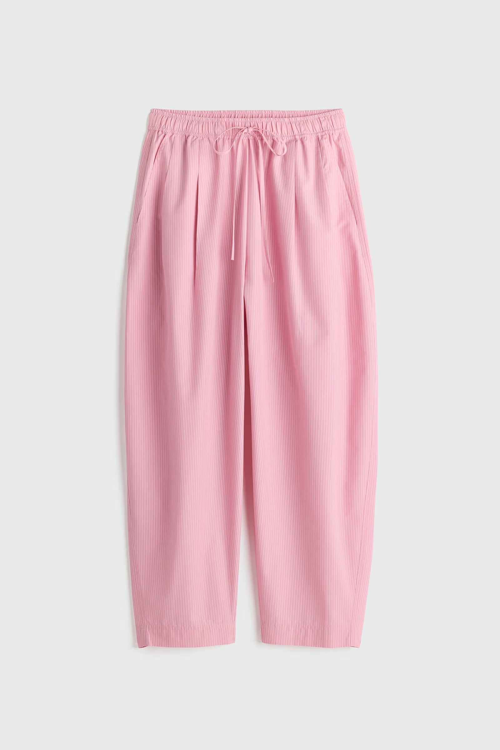 Pink pants on a light gray background