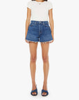 Woman wearing a white t-shirt and blue denim shorts on a white background