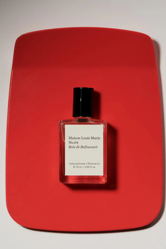Perfume Oil No.04 Bois De Balincourt .5oz on red mat