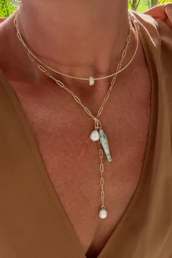 Thatch Fortuna Green Dot Charm on model on lariat