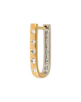 A small huggie hoop earring in two-tone yellow and silver white gold, featuring five clear round-cut stones set along the front.