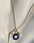Thatch Soleil Lapis and Mother of Pearl Charm with other charms