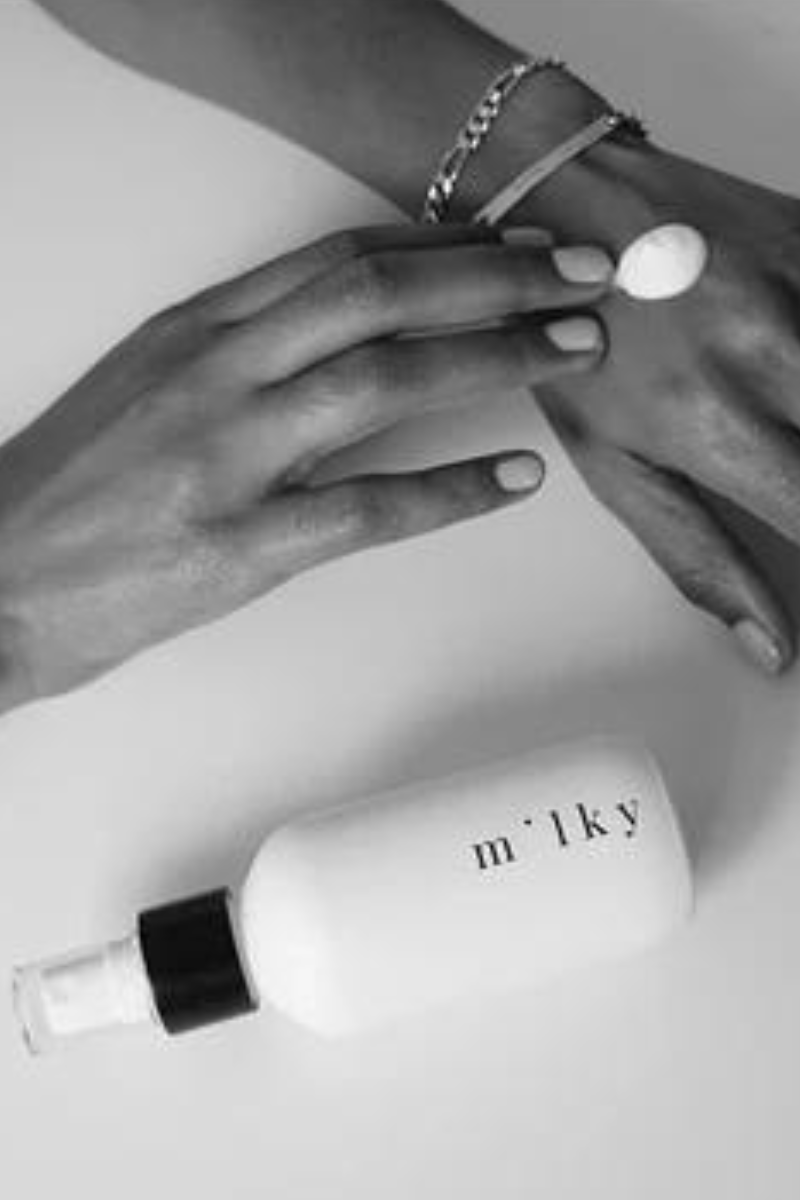 Riddle 4oz Milky Spray Lotion Santal on hand