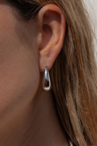 Thatch Lumi Hoop Earring Rhodium on ear