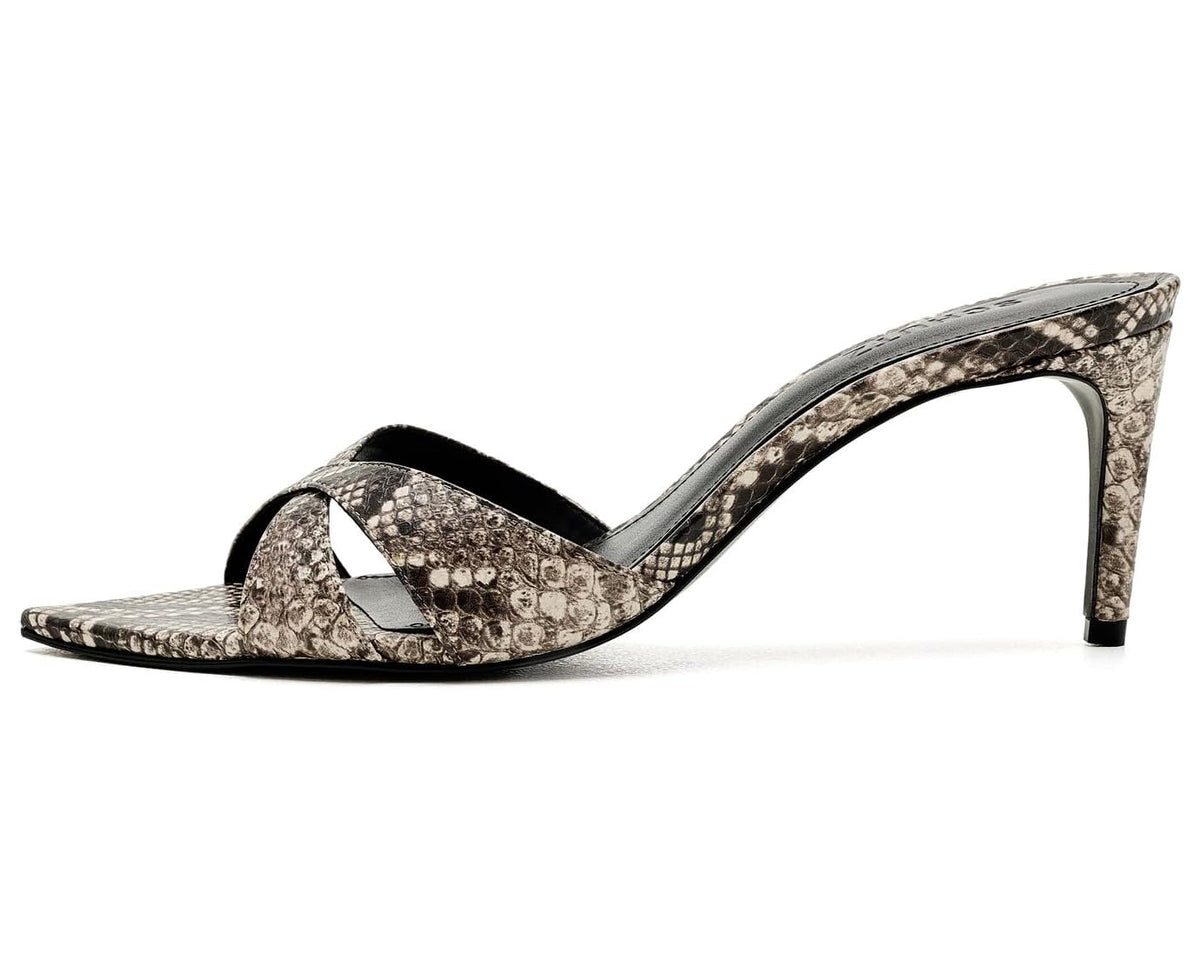 A single women's heeled sandal with a snakeskin pattern in beige, brown, and black, featuring a pointed toe, open side, and a slim high heel on a white background.