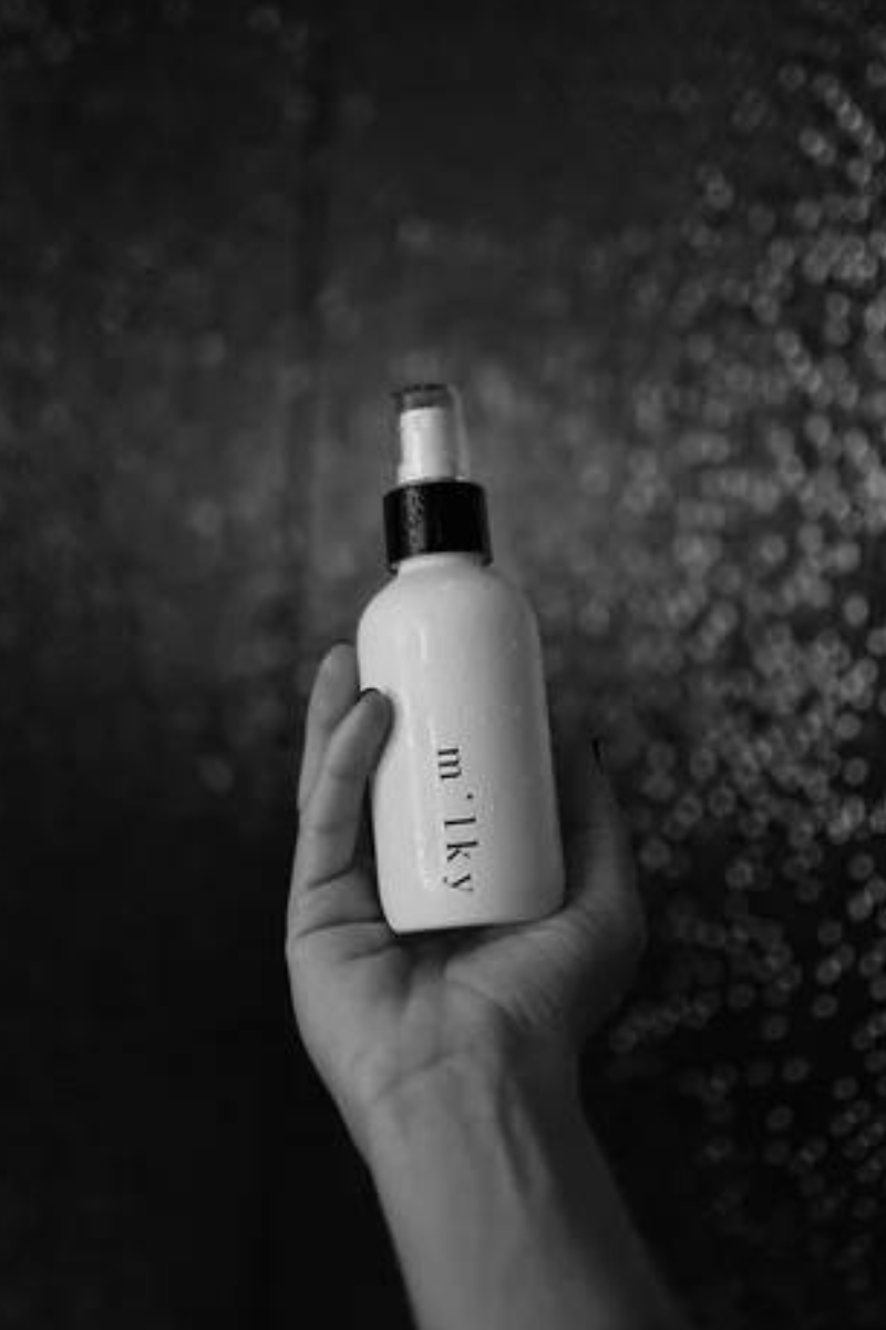 Riddle 4oz Milky Spray Lotion Santal in shower